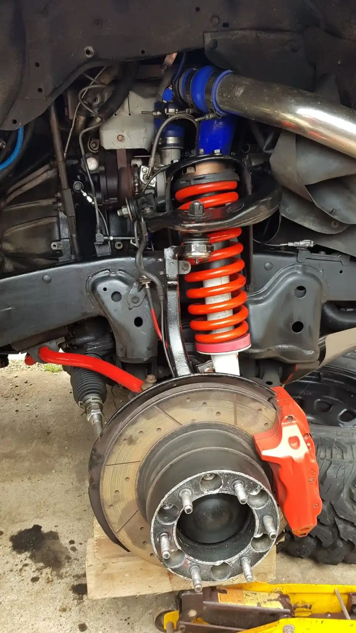 Front and rear suspension system maintenance